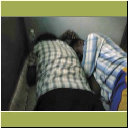 sleeping on floor of train.JPG